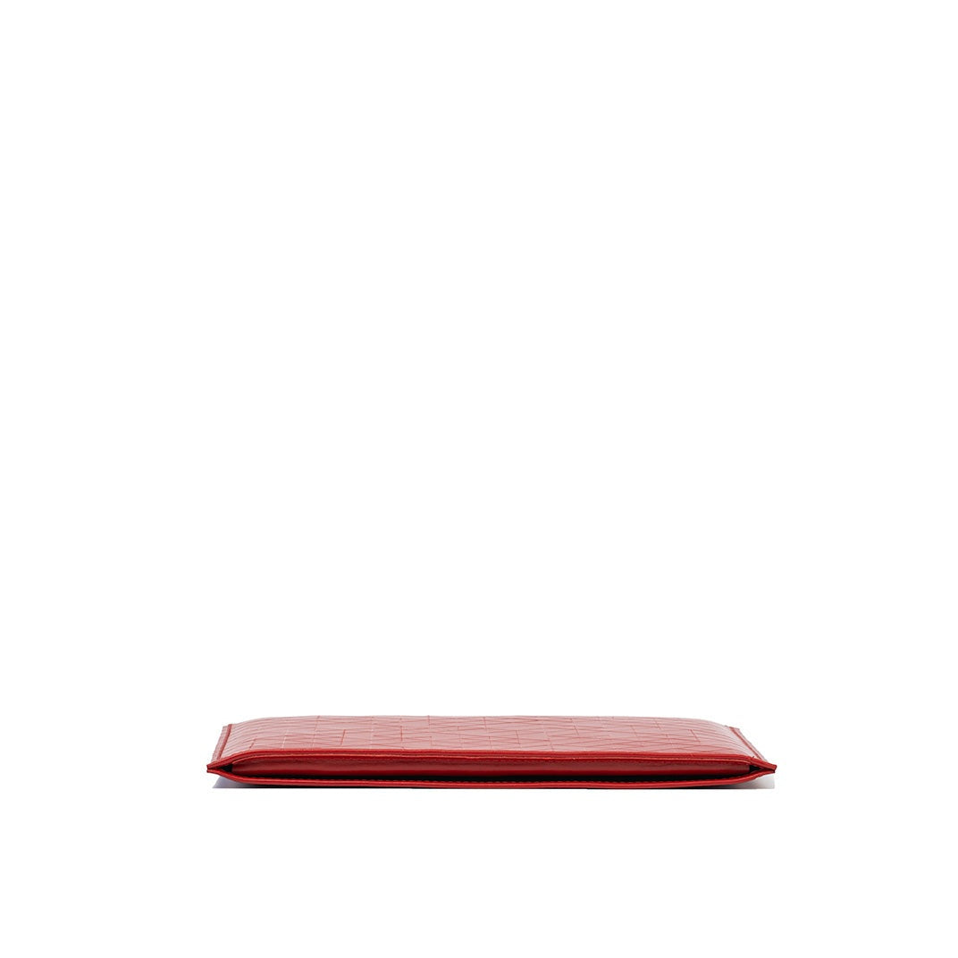 Slim red leather sleeve for iPad with minimalist design and slim profile