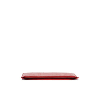 Slim red leather sleeve for iPad with minimalist design and slim profile