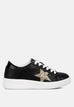 Black chunky sneakers with white sole and glitter gold star detail and white laces